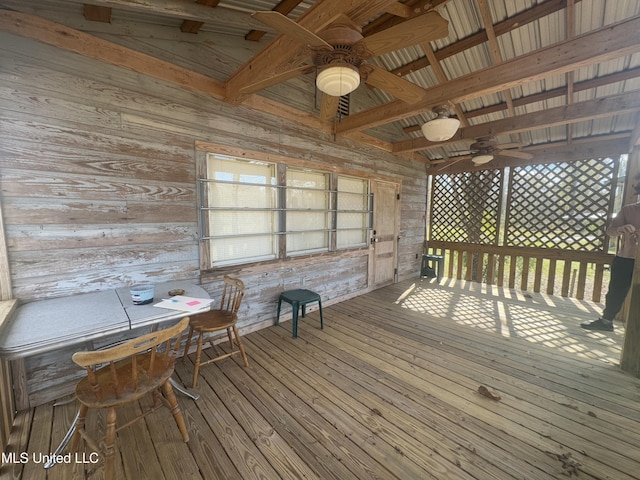 wooden deck featuring ceiling fan