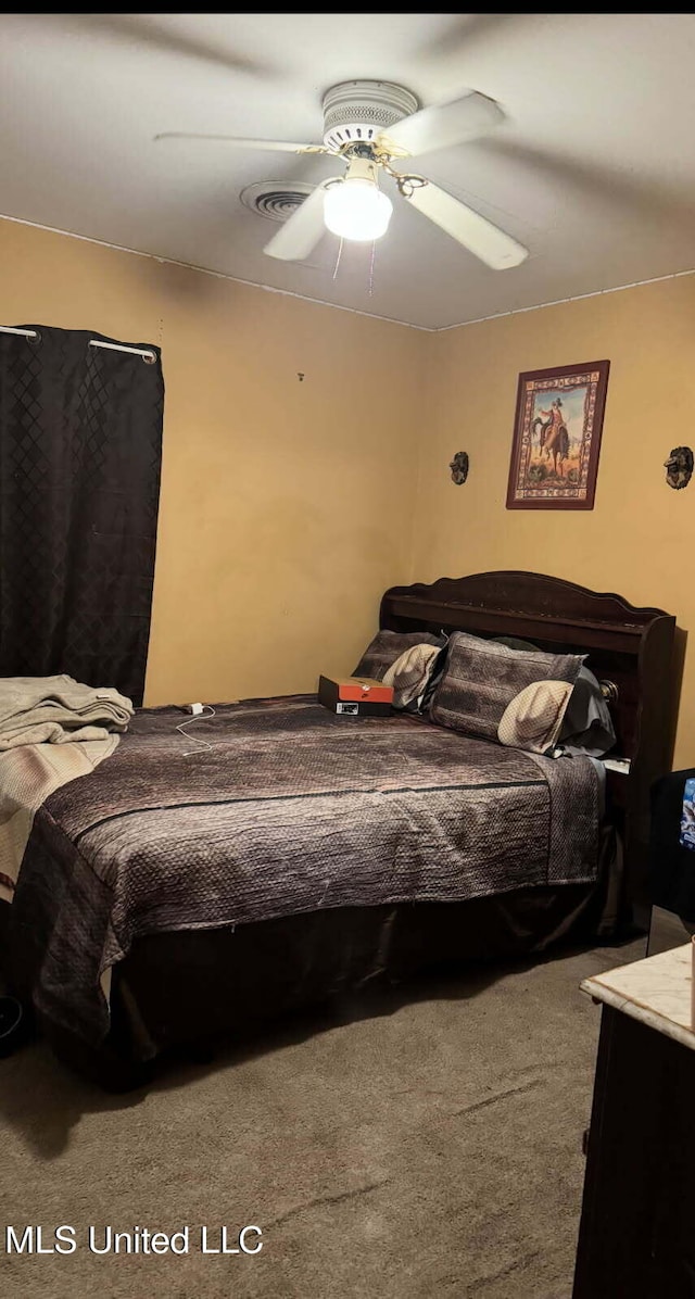 305 John Glenn Ave, Natchez, MS 39120 - carpeted bedroom featuring a ceiling fan
