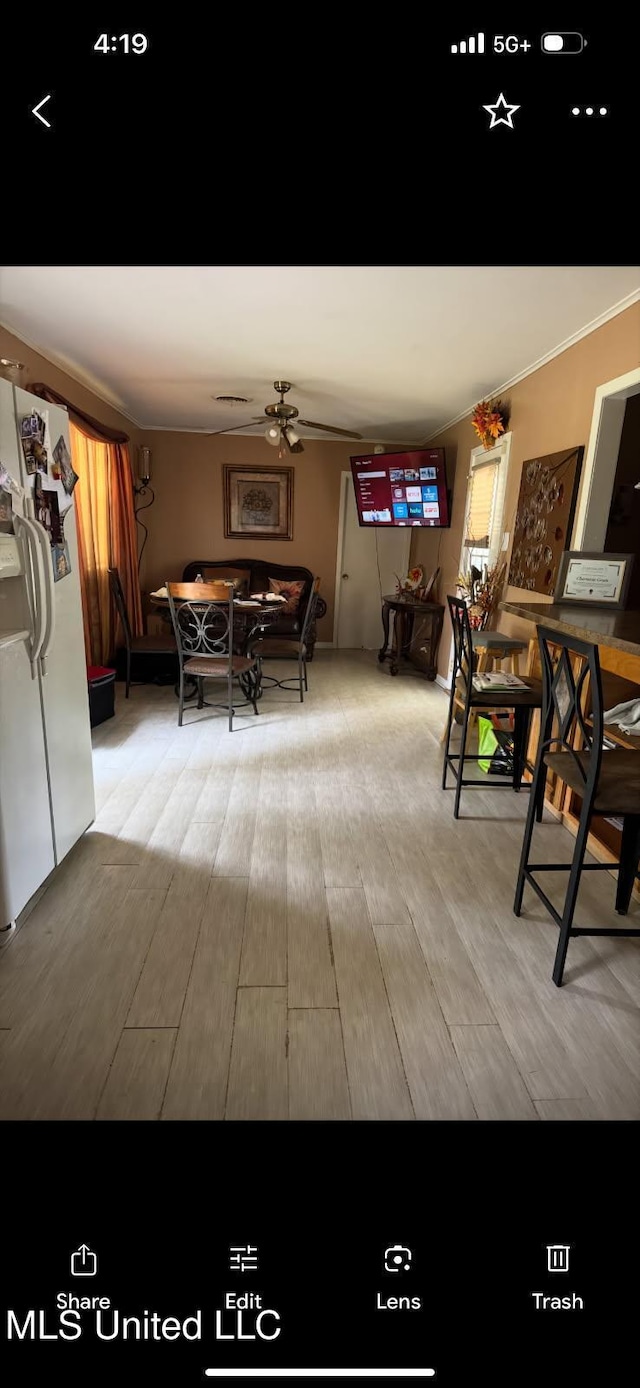 305 John Glenn Ave, Natchez, MS 39120 - dining space featuring wood finished floors, crown molding, and ceiling fan