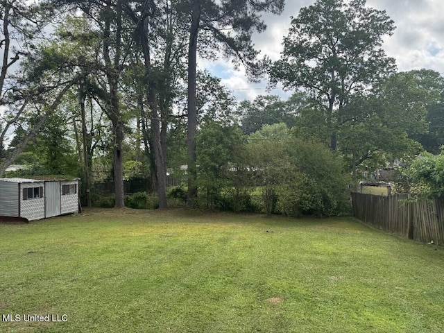 305 John Glenn Ave, Natchez, MS 39120 - view of yard featuring a storage shed and an outdoor structure