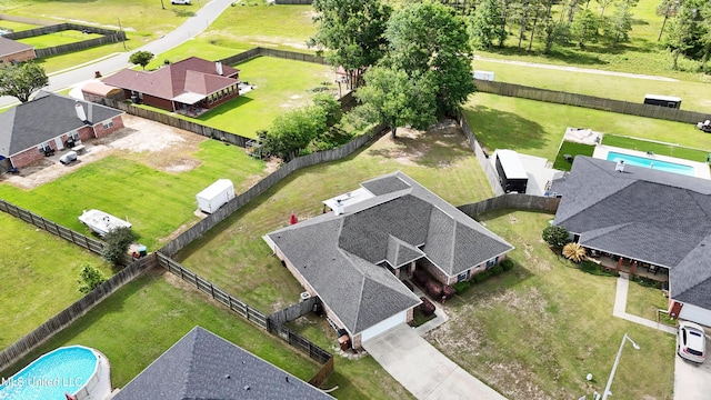 birds eye view of property with a residential view