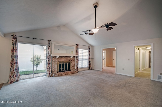 unfurnished living room featuring ceiling fan, high vaulted ceiling, carpet, and a fireplace