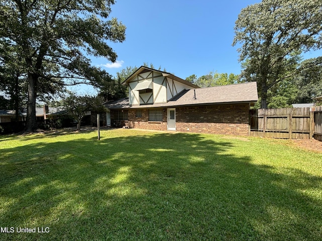 exterior space with a yard