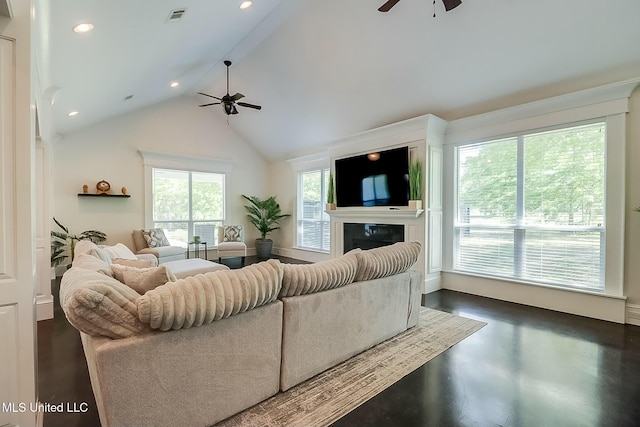 8521 Julia Dr, Vancleave, MS 39565 - living room with recessed lighting, visible vents, a glass covered fireplace, high vaulted ceiling, and ceiling fan