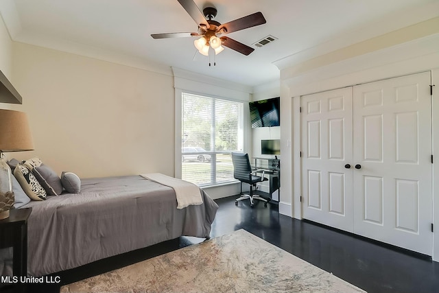 8521 Julia Dr, Vancleave, MS 39565 - bedroom featuring ceiling fan, visible vents, a closet, and ornamental molding