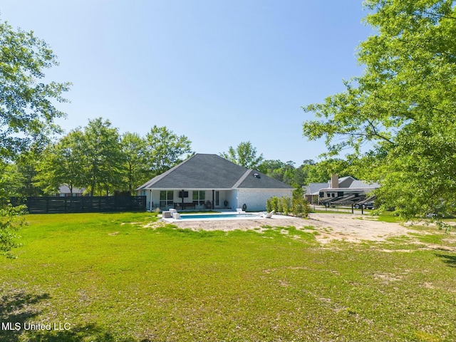 8521 Julia Dr, Vancleave, MS 39565 - back of house with an outdoor pool, a yard, and fence private yard