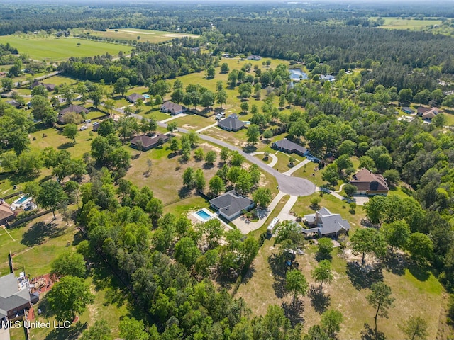 8521 Julia Dr, Vancleave, MS 39565 - bird's eye view with a view of trees and a residential view
