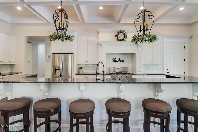 8521 Julia Dr, Vancleave, MS 39565 - kitchen featuring range with gas cooktop, backsplash, stainless steel refrigerator with ice dispenser, and coffered ceiling