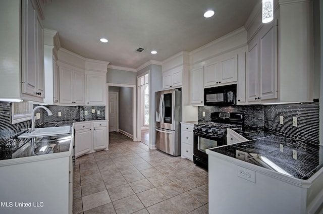 kitchen featuring black appliances, sink, white cabinetry, crown molding, and light tile patterned floors