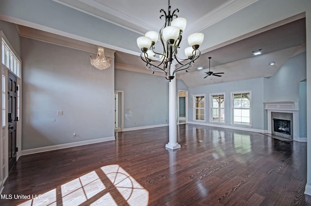 unfurnished living room with crown molding, dark hardwood / wood-style floors, and ceiling fan with notable chandelier