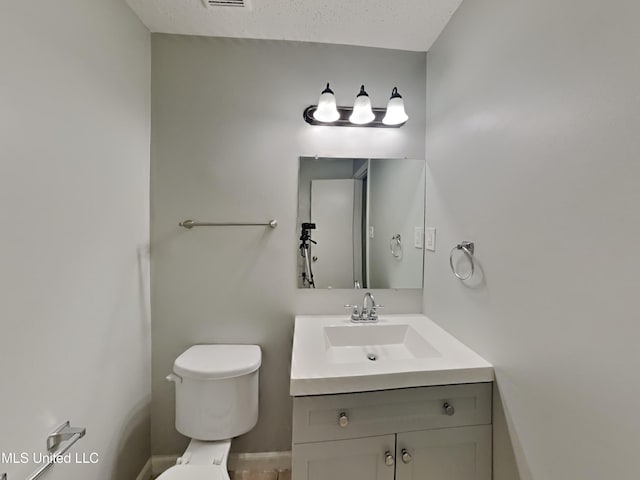 6525 Yorkshire Rd, Horn Lake, MS 38637 - half bath featuring toilet, vanity, and baseboards