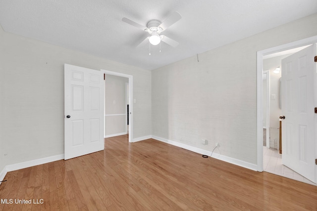 8279 Dunn Ln, Olive Branch, MS 38654 - unfurnished room featuring ceiling fan and wood finished floors