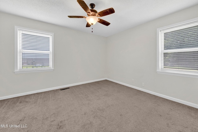 8279 Dunn Ln, Olive Branch, MS 38654 - spare room featuring a ceiling fan and carpet flooring