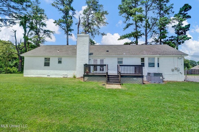 8279 Dunn Ln, Olive Branch, MS 38654 - rear view of house with crawl space, a wooden deck, and a yard