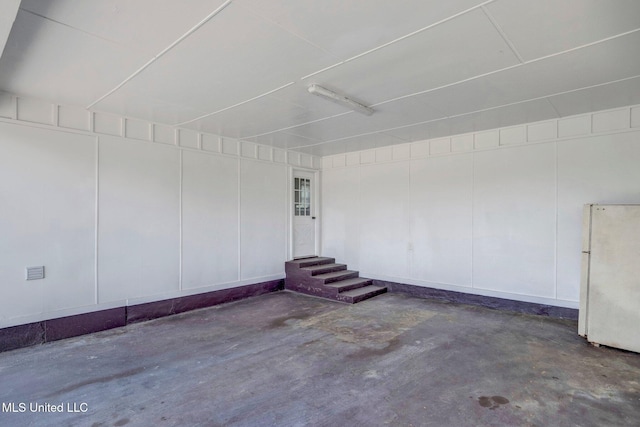 8279 Dunn Ln, Olive Branch, MS 38654 - garage featuring freestanding refrigerator