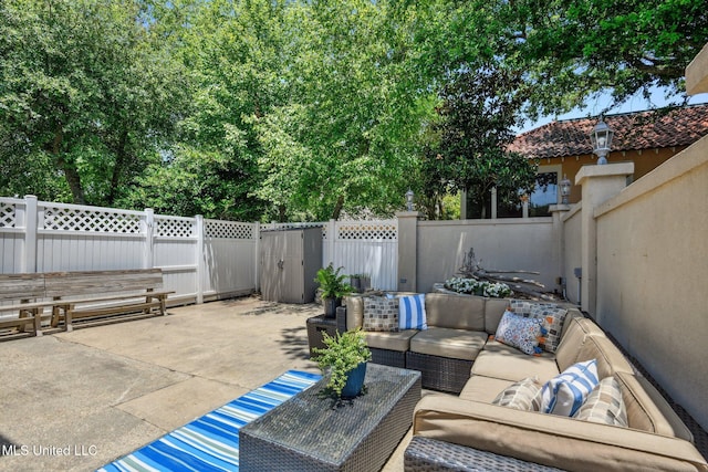 view of patio featuring a fenced backyard and an outdoor hangout area