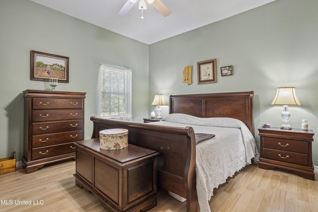 bedroom featuring light wood-style flooring and ceiling fan