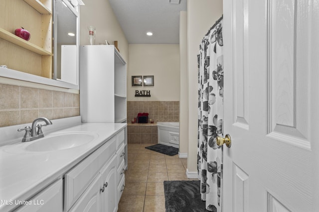 full bathroom featuring recessed lighting, tile patterned floors, tasteful backsplash, and vanity