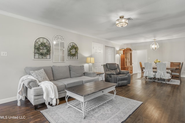 living room with crown molding, baseboards, dark wood finished floors, and visible vents