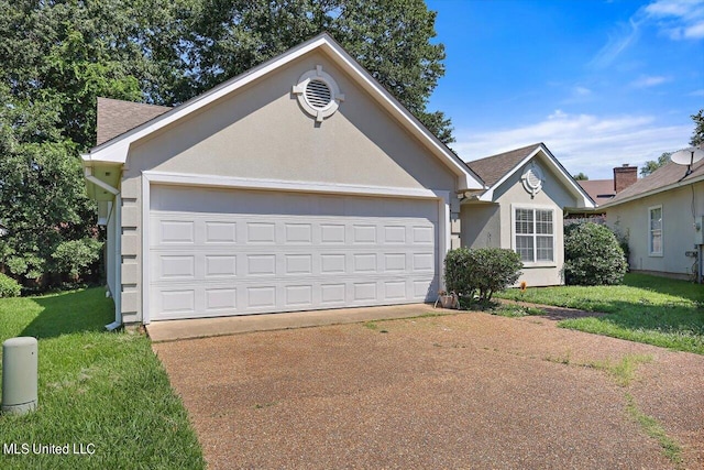 ranch-style home with a front lawn and a garage