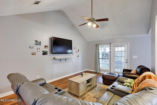 living room featuring ceiling fan, high vaulted ceiling, and hardwood / wood-style floors