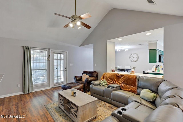 living room with ceiling fan, high vaulted ceiling, and dark hardwood / wood-style flooring