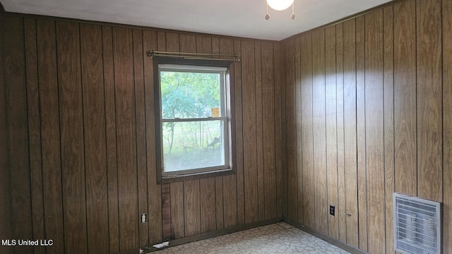 210 Ford St, Como, MS 38619 - spare room with wooden walls and light flooring