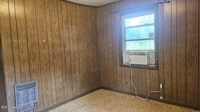 210 Ford St, Como, MS 38619 - unfurnished room featuring wood walls and cooling unit