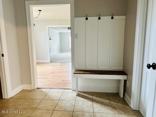 mudroom with light hardwood / wood-style floors