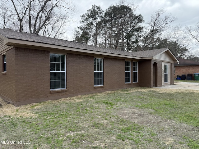 exterior space with a yard