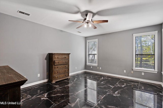 3555 Bonner Dr, Olive Branch, MS 38654 - bedroom with marble finish floor, visible vents, and multiple windows