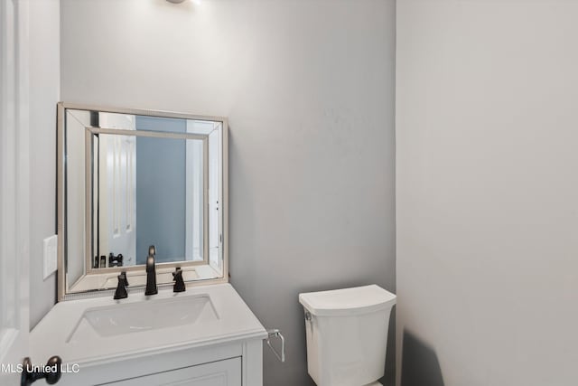 3555 Bonner Dr, Olive Branch, MS 38654 - bathroom with toilet and vanity