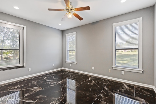 3555 Bonner Dr, Olive Branch, MS 38654 - spare room with baseboards, recessed lighting, a ceiling fan, and marble finish floor