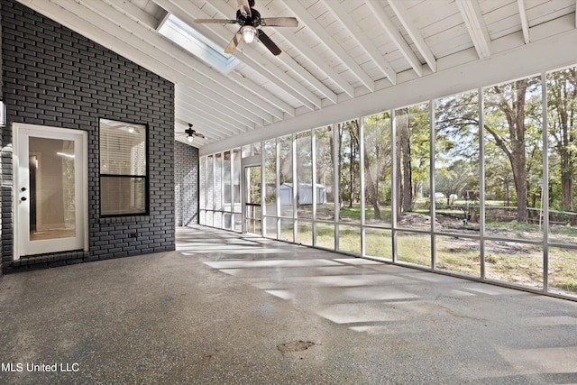 3555 Bonner Dr, Olive Branch, MS 38654 - unfurnished sunroom with beam ceiling, a ceiling fan, high vaulted ceiling, and a skylight