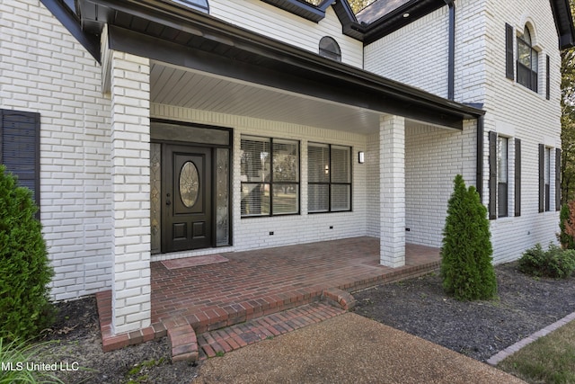 3555 Bonner Dr, Olive Branch, MS 38654 - property entrance with brick siding and a porch
