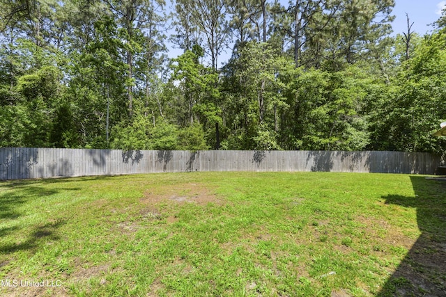view of yard with fence