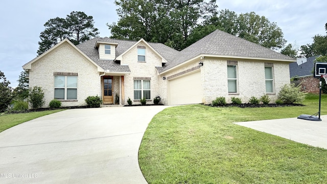 580 Hickory Pl, Brandon, MS 39047 - view of front of house featuring brick siding, roof with shingles, a front yard, a garage, and concrete driveway