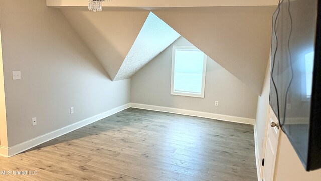 580 Hickory Pl, Brandon, MS 39047 - additional living space featuring wood finished floors and vaulted ceiling