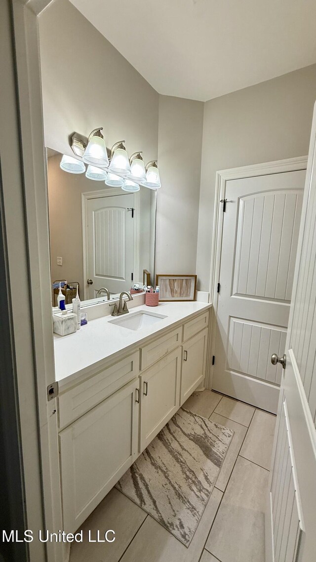 580 Hickory Pl, Brandon, MS 39047 - bathroom with vanity and tile patterned floors