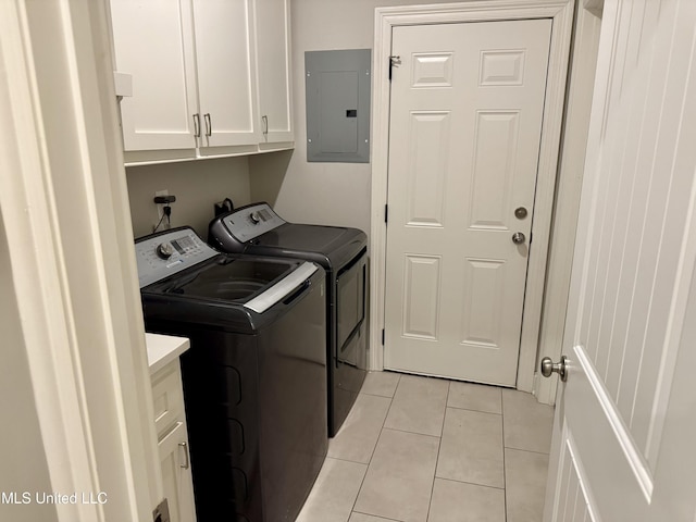 580 Hickory Pl, Brandon, MS 39047 - washroom featuring electric panel, washing machine and dryer, cabinet space, and light tile patterned floors