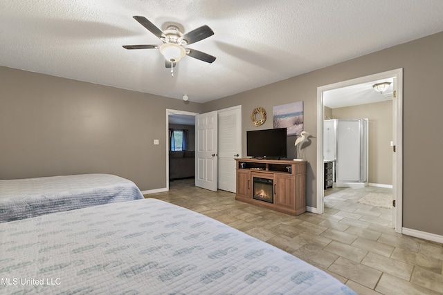 bedroom featuring a textured ceiling and ceiling fan