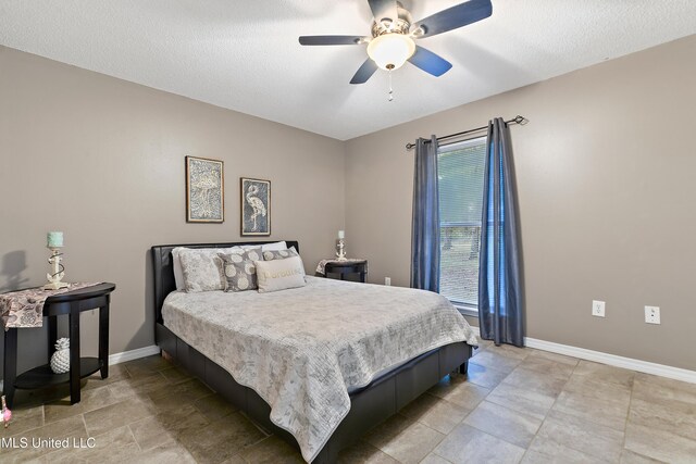 1160 Lucas Rd, Lucedale, MS 39452 - bedroom with baseboards and ceiling fan