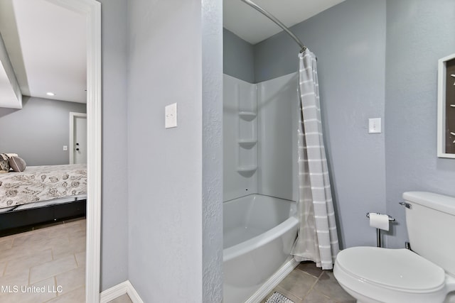 bathroom featuring toilet, tile patterned floors, and shower / bathtub combination with curtain