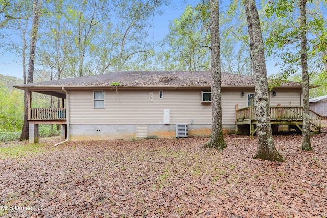 1160 Lucas Rd, Lucedale, MS 39452 - back of house featuring crawl space, a deck, central AC unit, and a shingled roof