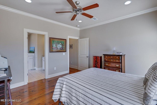 bedroom with recessed lighting, visible vents, ornamental molding, wood finished floors, and baseboards