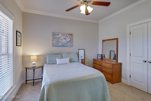 bedroom with baseboards, carpet, and crown molding