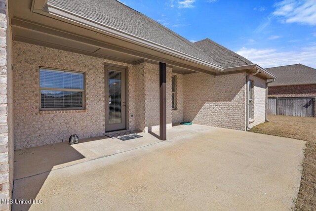 view of patio with fence