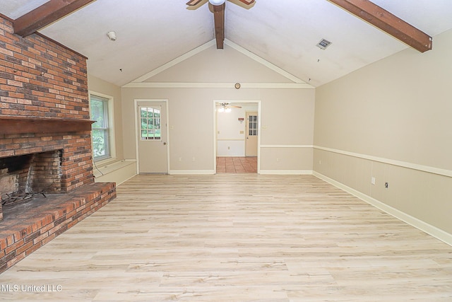 unfurnished living room featuring ceiling fan, light wood-type flooring, a brick fireplace, and baseboards