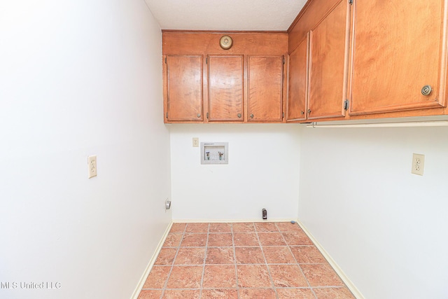 laundry area featuring cabinet space, hookup for a washing machine, baseboards, and gas dryer hookup
