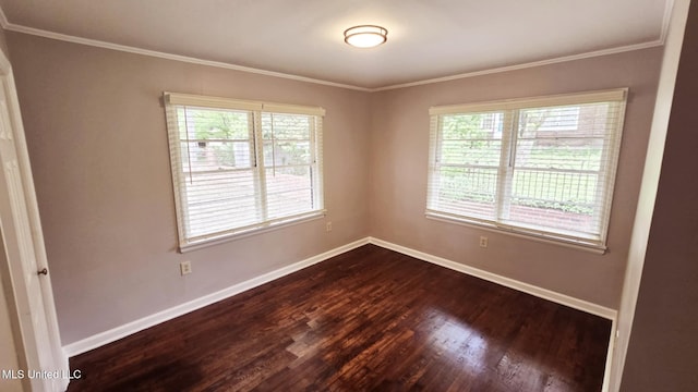 260 Roberts Ave, Holly Springs, MS 38635 - unfurnished room featuring baseboards, ornamental molding, a wealth of natural light, and dark wood-type flooring